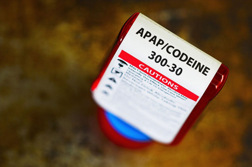 prescription bottle of codeine with warning label - harmful effects and addiction to codeine - mountain laurel recovery center -pennsylvania drug addiction rehab for adults