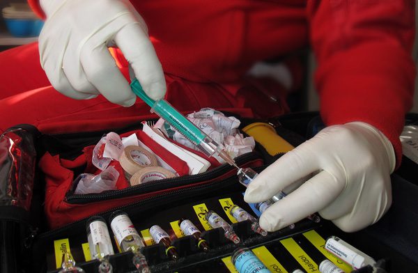 increased use naloxone first responders - paramedic with syringe - mountain laurel recovery center