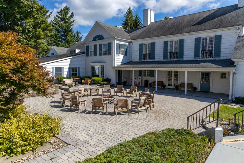 Mountain Laurel Recovery Center - Pennsylvania Addiction Treatment Center - Group circle around firepit - recover from addiction in the serenity of northern Pennsylvania